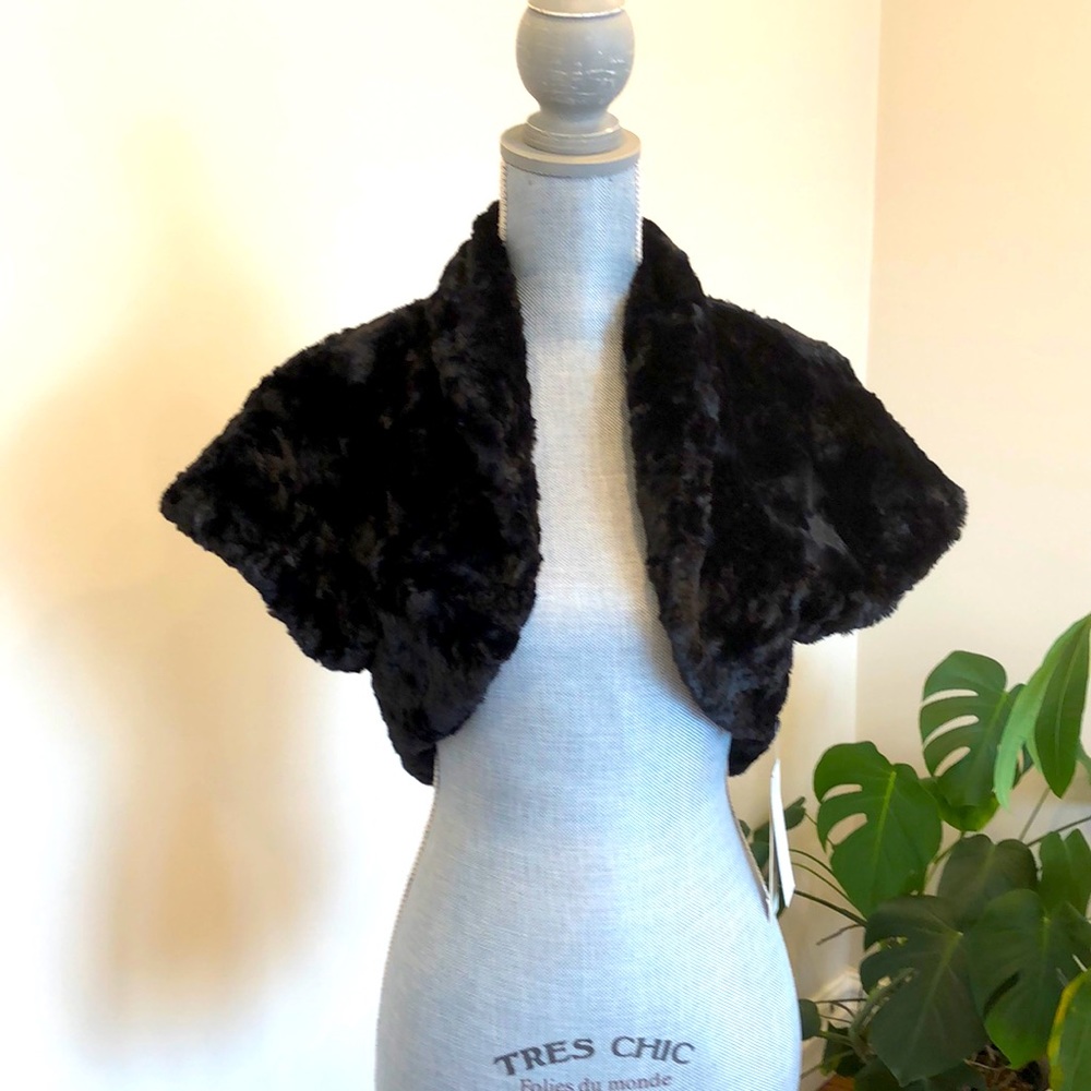 NWT- Make a statement with this beautiful bolo shrug, that is luxuriousl…
